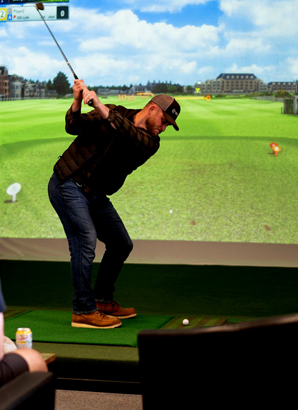 A golfer swinging a club